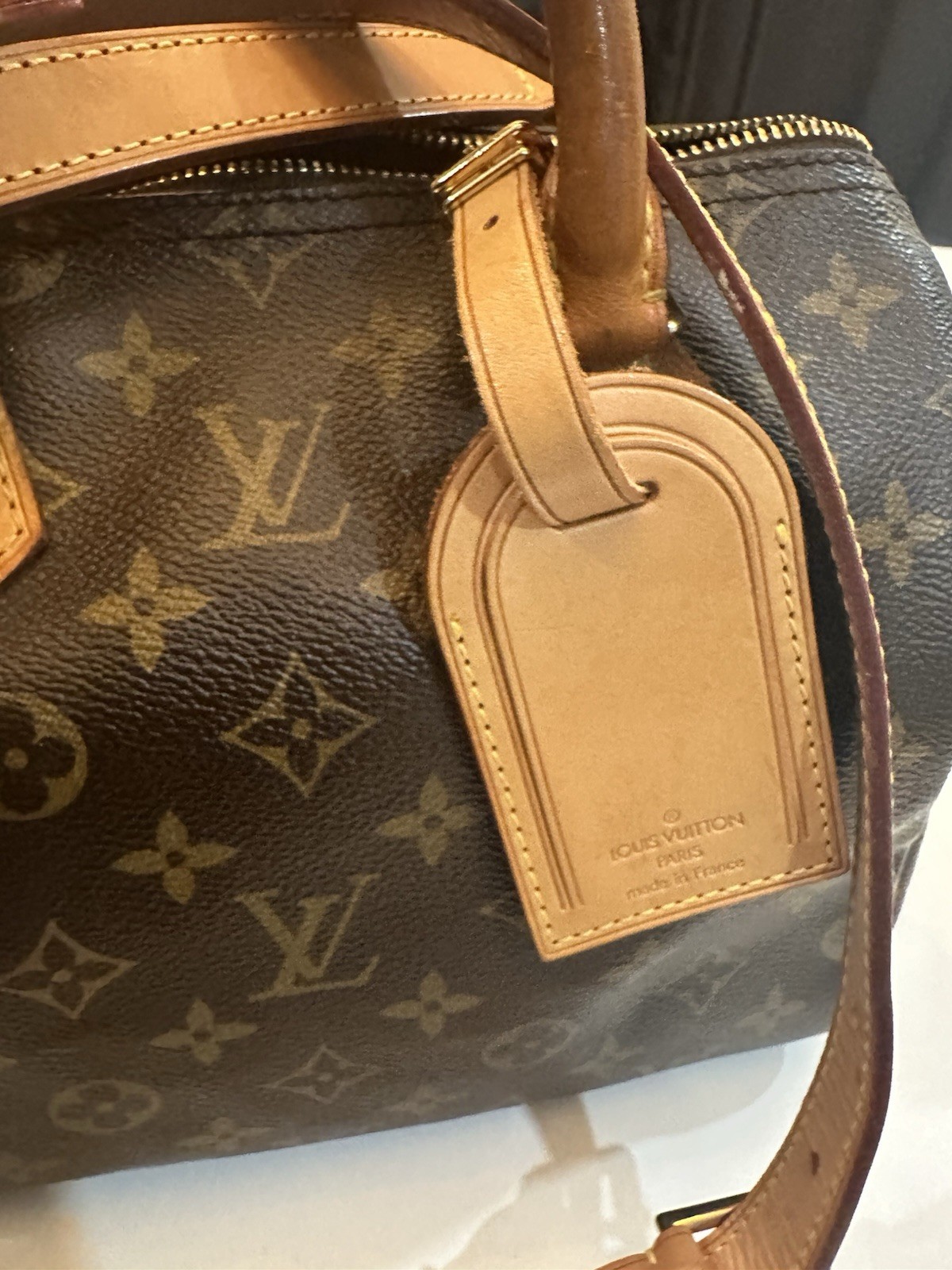 Louis Vuitton Monogram Speedy 25 with Lock and crossbody strap